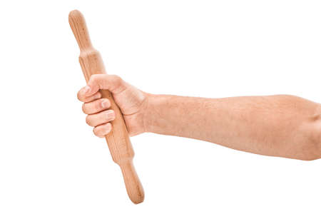 hand with wooden rolling pin isolated on white backgroundの写真素材