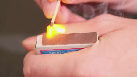 lighting match macro shot slow motion. close upの写真素材