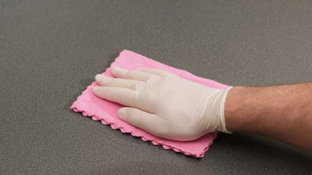Wipe the table a damp cloth. close opの写真素材