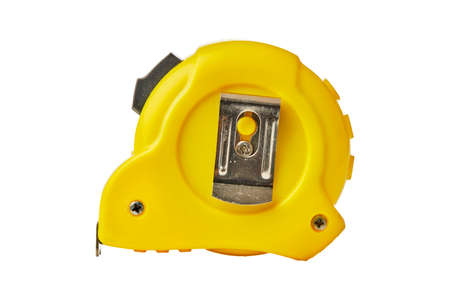 Yellow tape measure isolated on white backgroundの写真素材