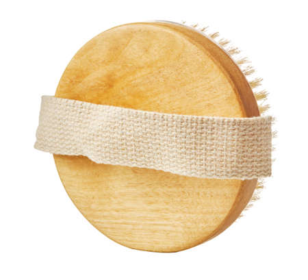 Wooden massager with natural bristle, isolated on whiteの写真素材
