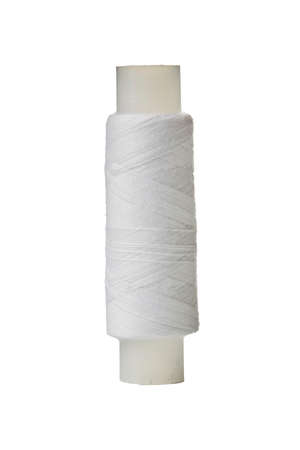 Spool of thread on a white background. Close upの写真素材
