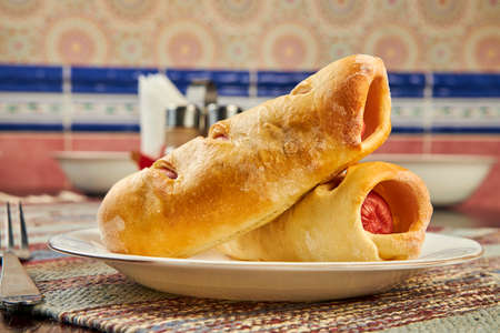 sausages baked in pastry in a fast food cafe close upの写真素材