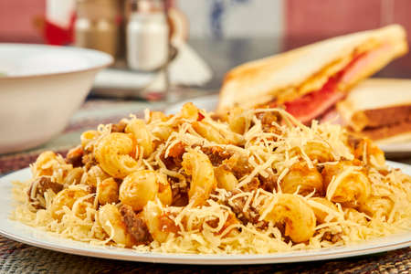 Pasta with meat with cheese in cafe close upの写真素材