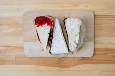 white chocolate cake, strawberries cake, cut pieceの写真素材