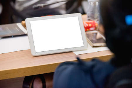 Business people working on laptop computer and phone in meeting roomの写真素材