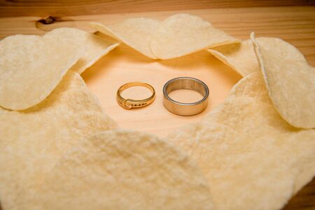 ring and potato chips, wedding rings, Engagement rings, wedding ceremonyの写真素材