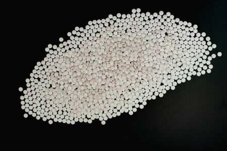 Many medicine pills isolated on black