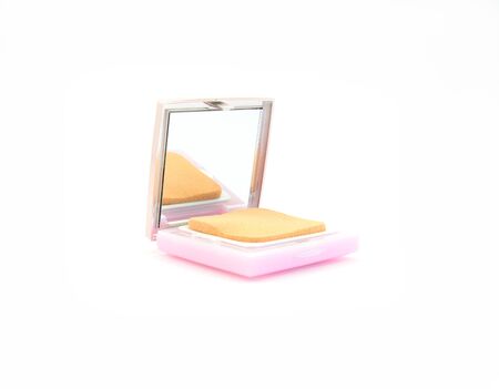 Orange powder puffs and pink box has mirrorの写真素材
