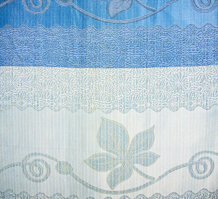 White and blue  drape pattern has gray color flowerの写真素材