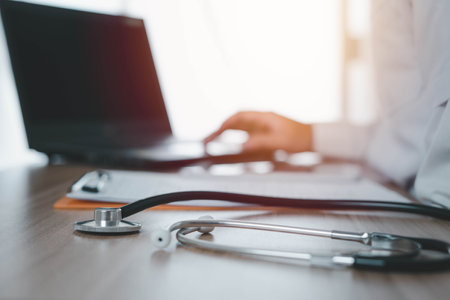 Specialized doctors are working with laptop to print patient information or are analyzing the cause of pathogens, Concept of medical treatment Health care, public health, prevention of virus.の写真素材