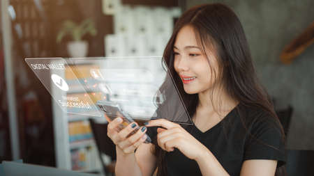 Asian Woman signs in on smartphone to access financial transactions digital cybercrime security system to verify identity, scan fingerprints enter passwords, Concept privacy protection Internet hackerの写真素材