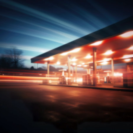 Blurred image of a gas station at night. Intentional motion blurの素材