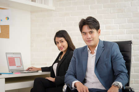 Business Asian people in formal outfit working together and brainstorming in modern office workplace.の写真素材