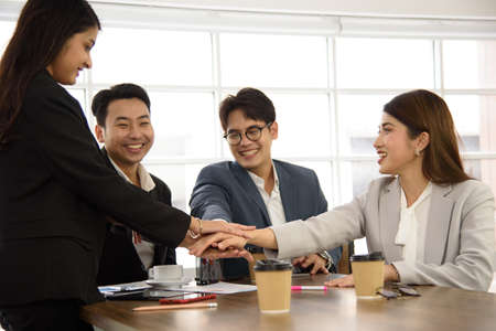 Business Asian people in formal suit meeting and working together in modern workspace.の写真素材