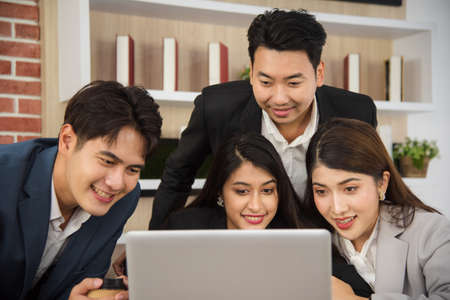 Business Asian people in formal suit meeting and working together in modern workspace.の写真素材
