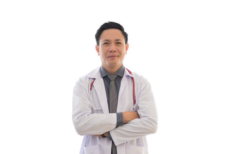 Asian doctor man portrait in professional uniform standing with smile and confidence isolated in white background.の写真素材