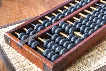 Accountant calculating with Abacusの写真素材