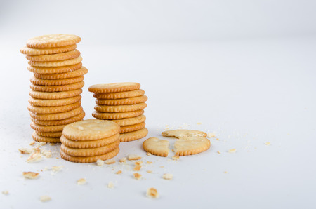 Broken crackers look like towers are falling down.の写真素材
