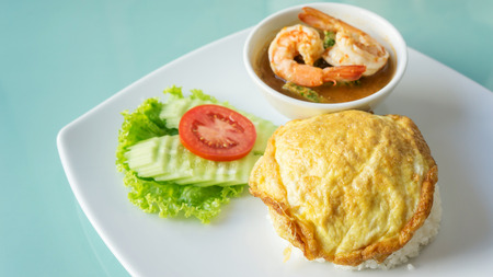 Thai omelet and shrimp spicy soup curry with vegetable omelet (thai vegetable)の写真素材