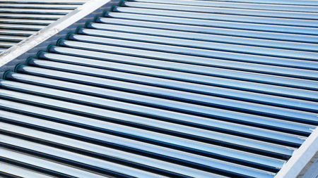 Closeup of vacuum tubes from solar water heating system.の写真素材