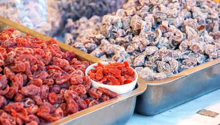 Assorted dried fruits in tray.の写真素材