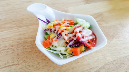 Fresh salad on the white bowl.の写真素材
