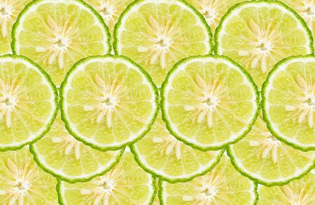 Green bergamot slices for a background.