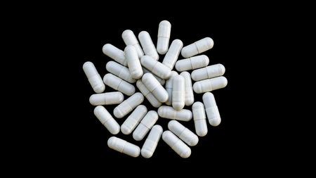 supplementary food or medicine on a black background.