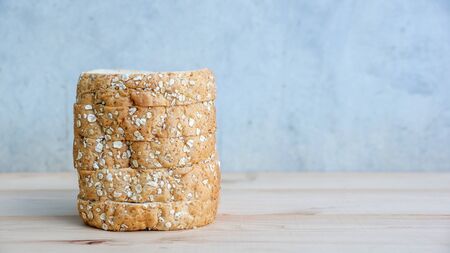 whole wheat bread on wooden background.の写真素材