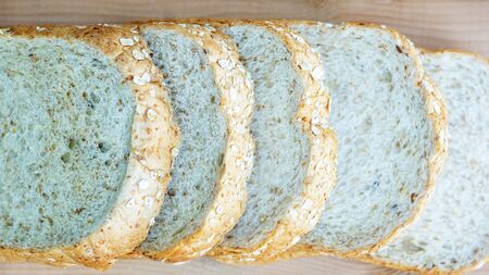 whole wheat bread on wooden background.の写真素材