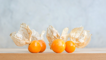 Cape gooseberry on wooden background, selective focus.の写真素材