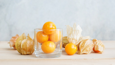 Cape gooseberry on wooden background.の写真素材