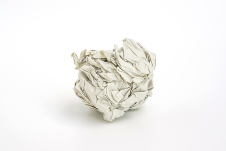 white crumpled paper on a white background.の写真素材