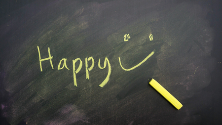 chalk pastels on a school blackboard for a background.の写真素材