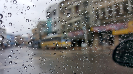 close up of wing mirror at the car in the raining day.の写真素材
