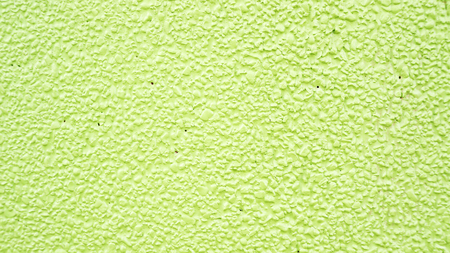 Green cement wall for a background.