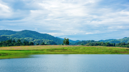 mountain range and lake at Singha park Chiang rai, Thailand.の写真素材