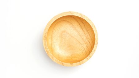 Wooden bowl on a white background.の写真素材