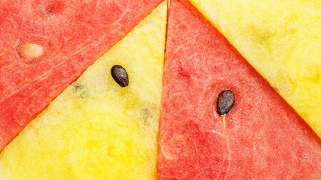 Close up of red and yellow watermelon for a background.の写真素材