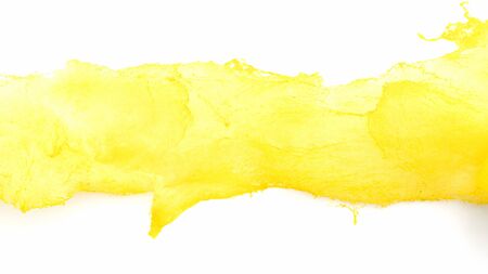 Yellow cotton candy on a white background.の写真素材