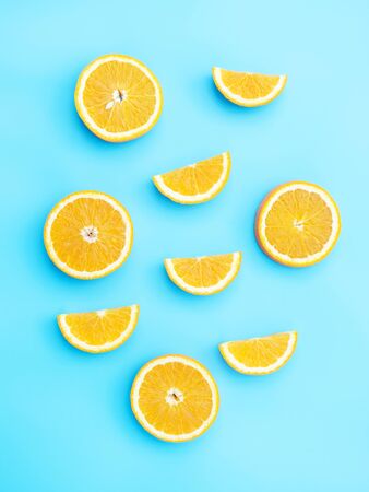 Oranges fruit on a blue background.の写真素材