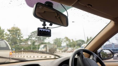 Windshield has installed a car camera on a rainy day.の写真素材