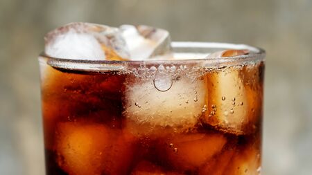 Iced aerated soft drink on a gray background.の写真素材