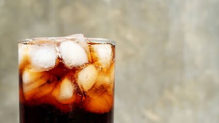 Iced aerated soft drink on a gray background.の写真素材