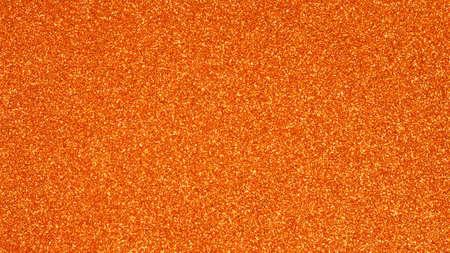 Orange glitter texture for background.の写真素材