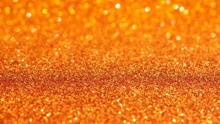Orange glitter texture for background.の写真素材