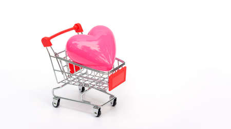 Pink heart in a shopping cart on a white background.の写真素材