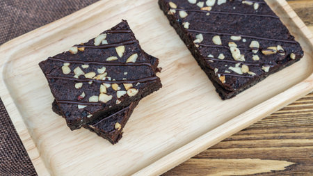 Brownies cake on a wooden table.の写真素材