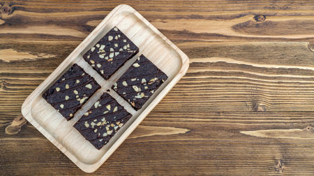Brownies cake on a wooden table.の写真素材